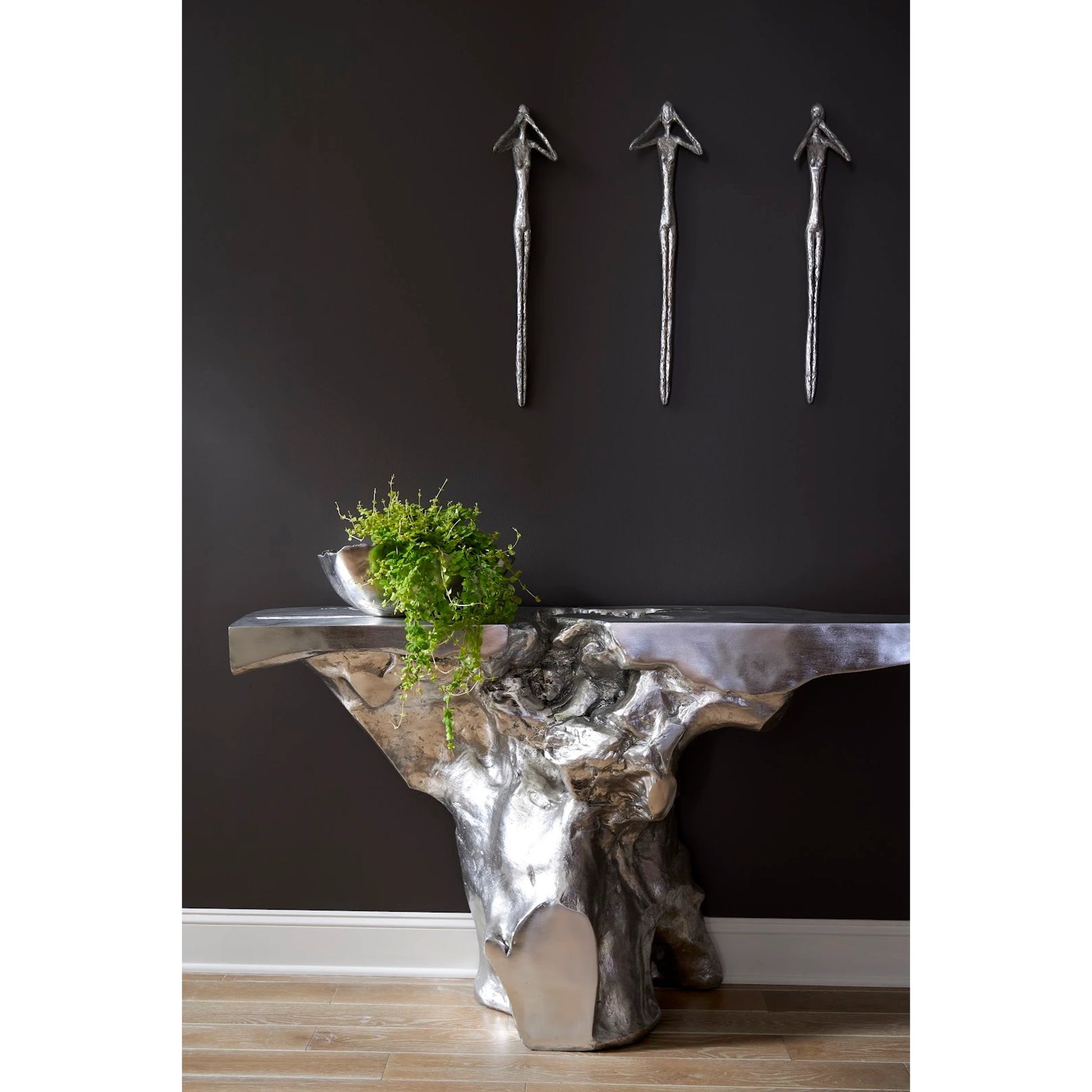 Crown Console by Phillips Collection in silver and silver leaf. Made from resin in a modern style.