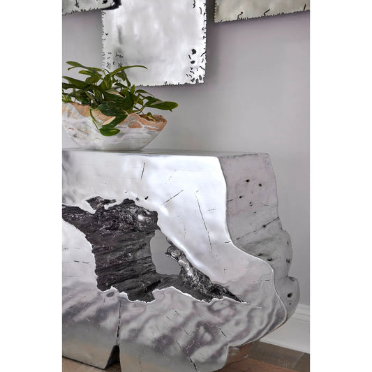 Freedom Console by Phillips Collection in silver leaf. Made from resin in a modern style.