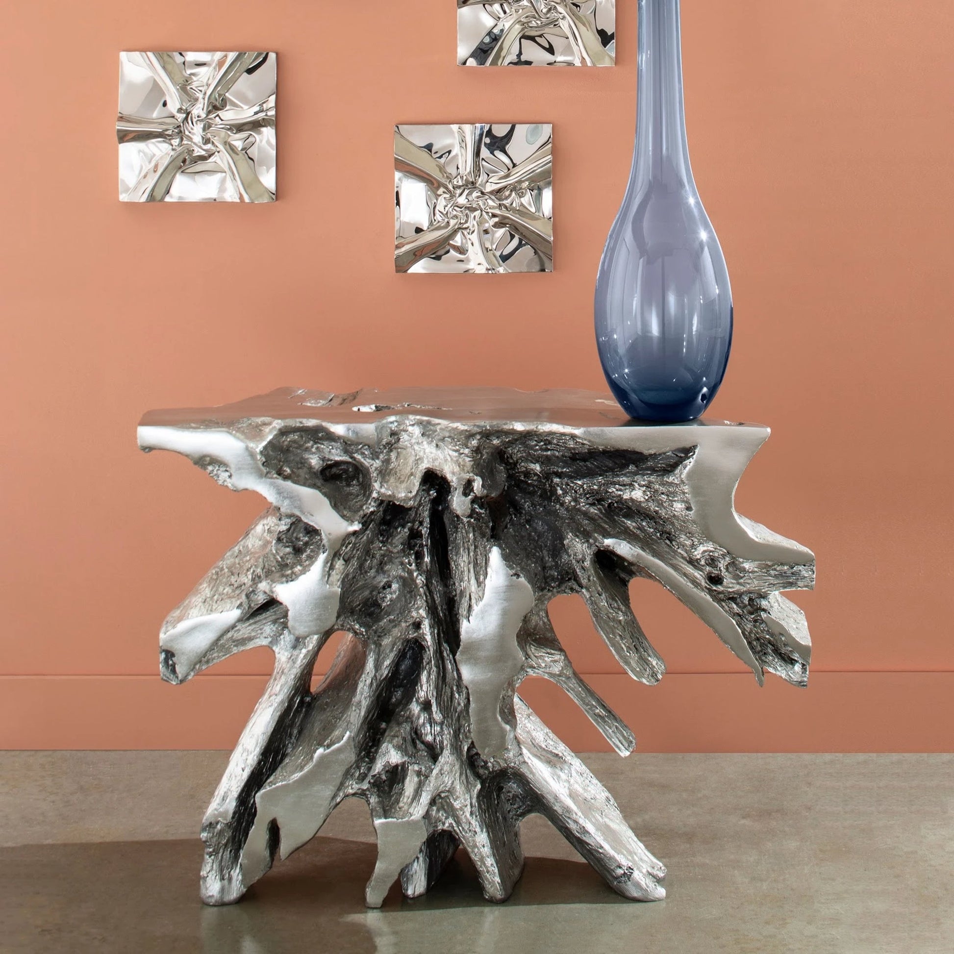Luxe Freeform Console Table by Phillips Collection in silver and silver leaf. Made from resin in a eclectic & global style.