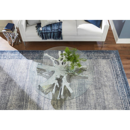 Freeform Coffee Table by Phillips Collection. Made from resin in a modern style.