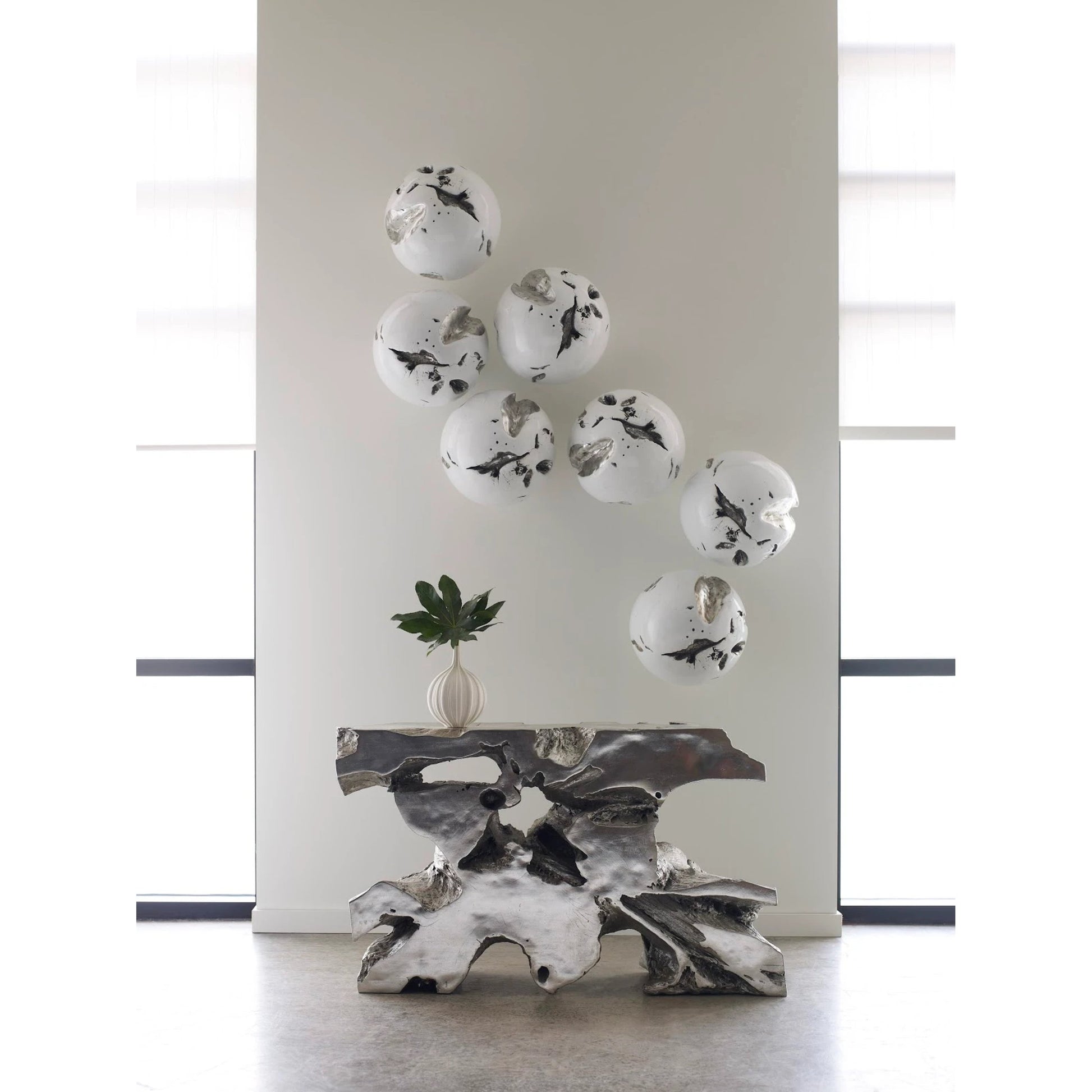 Cast Root Wall Ball by Phillips Collection in white, silver. Made from resin in a modern style.