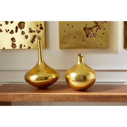 Julian Vase by Phillips Collection in gold and gold leaf. Made from resin in a eclectic & global style.