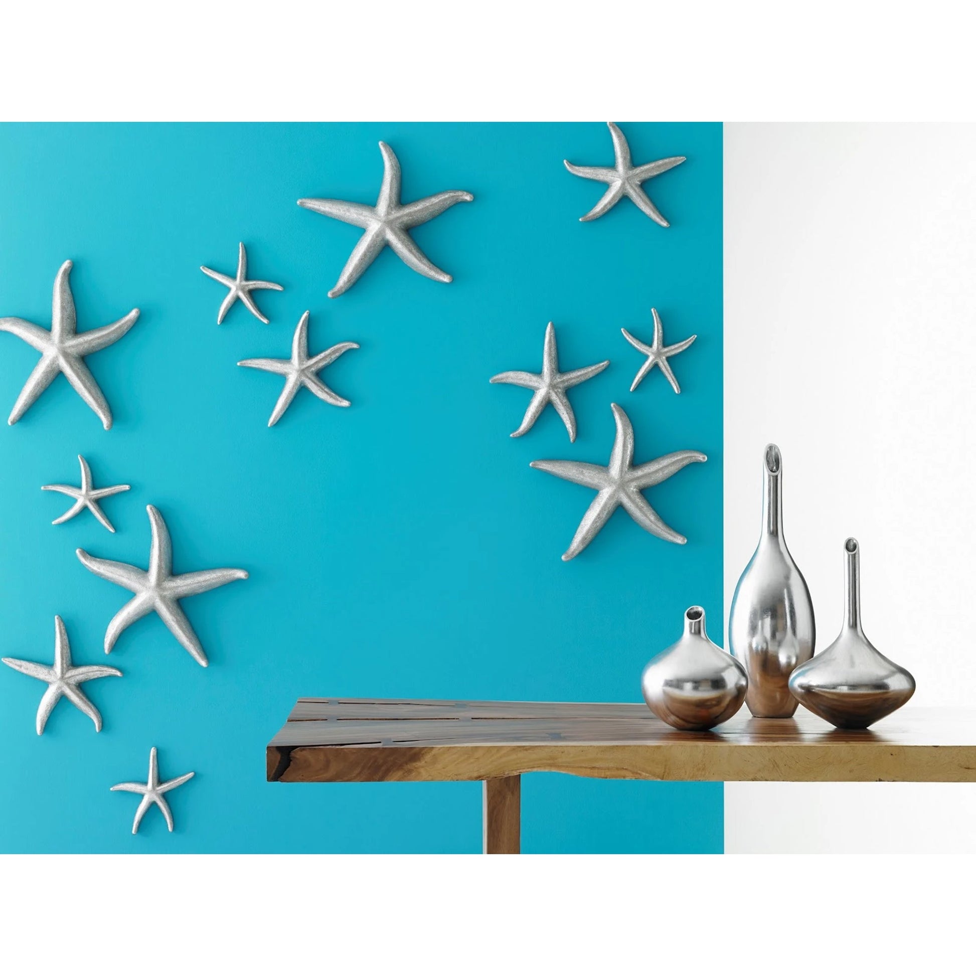 Starfish (Set of 4) by Phillips Collection. Made from resin in a coastal style.