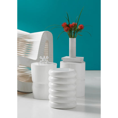 Carved Stool by Phillips Collection. Made from resin in a modern style.