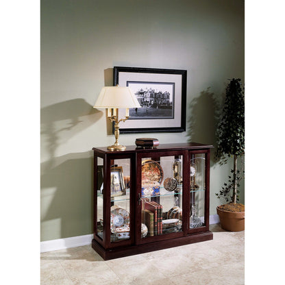 Curio Console by Pulaski Furniture in cherry brown. Made from select hardwoods in a traditional style.