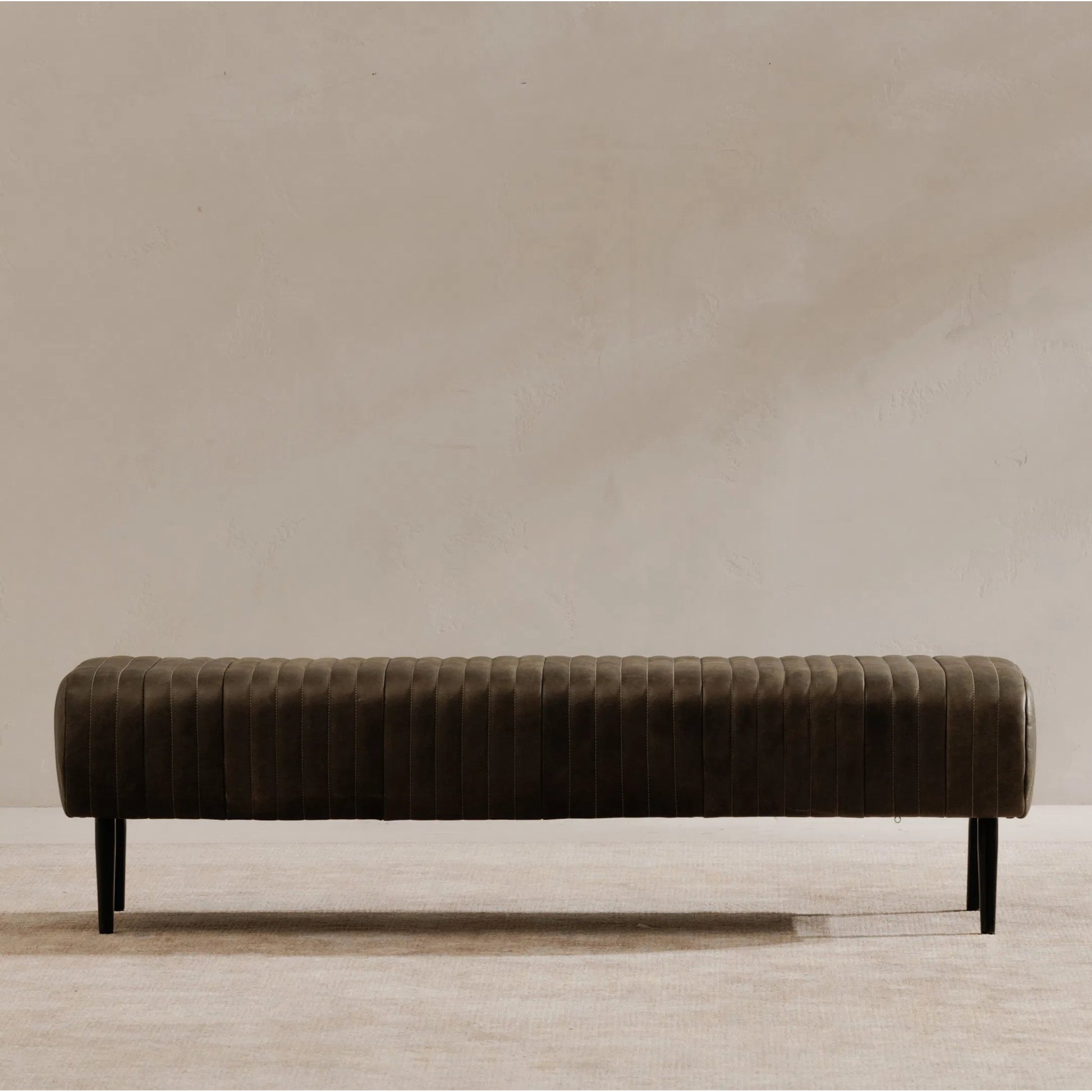 Endora Bench by Moe's Home Collection. Made from top grain leather, iron legs, foam, plywood in a modern style.