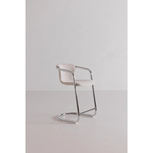Freeman Chrome Frame Counter Stool Blended by Moe's Home Collection in blended cream. Made from upholstery: 100% polyester fibre, chrome iron frame, plywood, foam cushioning in a unique style.