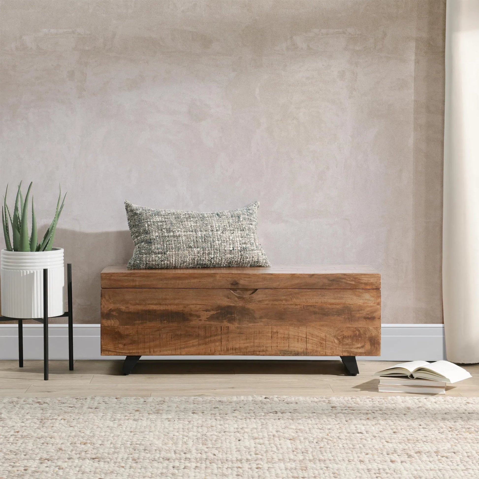 Axis Storage Trunk by Kosas Home. Made from mango wood top, iron legs in a modern style.