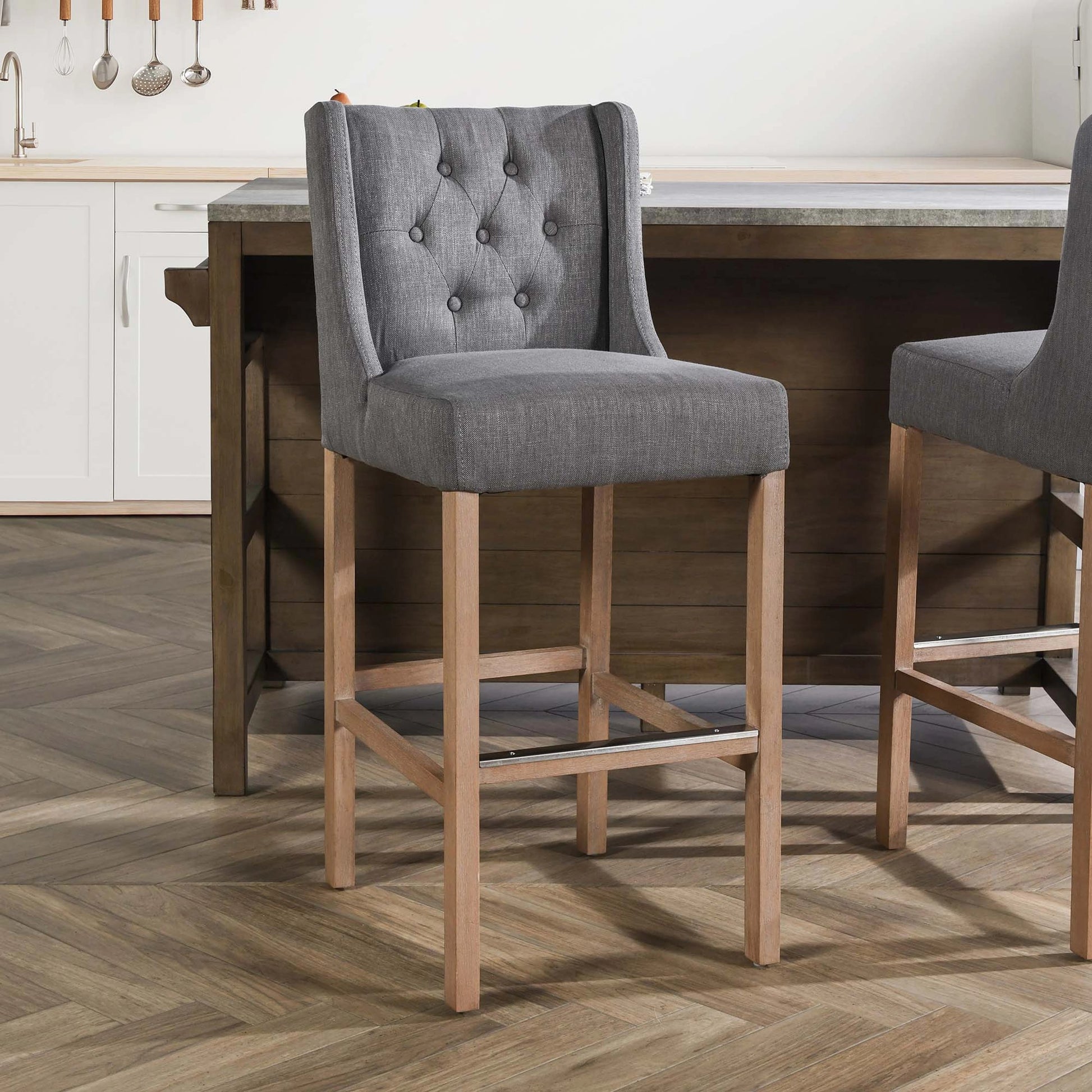 Karla Tufted Barstool by Kosas Home in gray. Made from blended upholstery (57% polyester 25% viscose 18% linen), rubber wood legs in a transitional style.