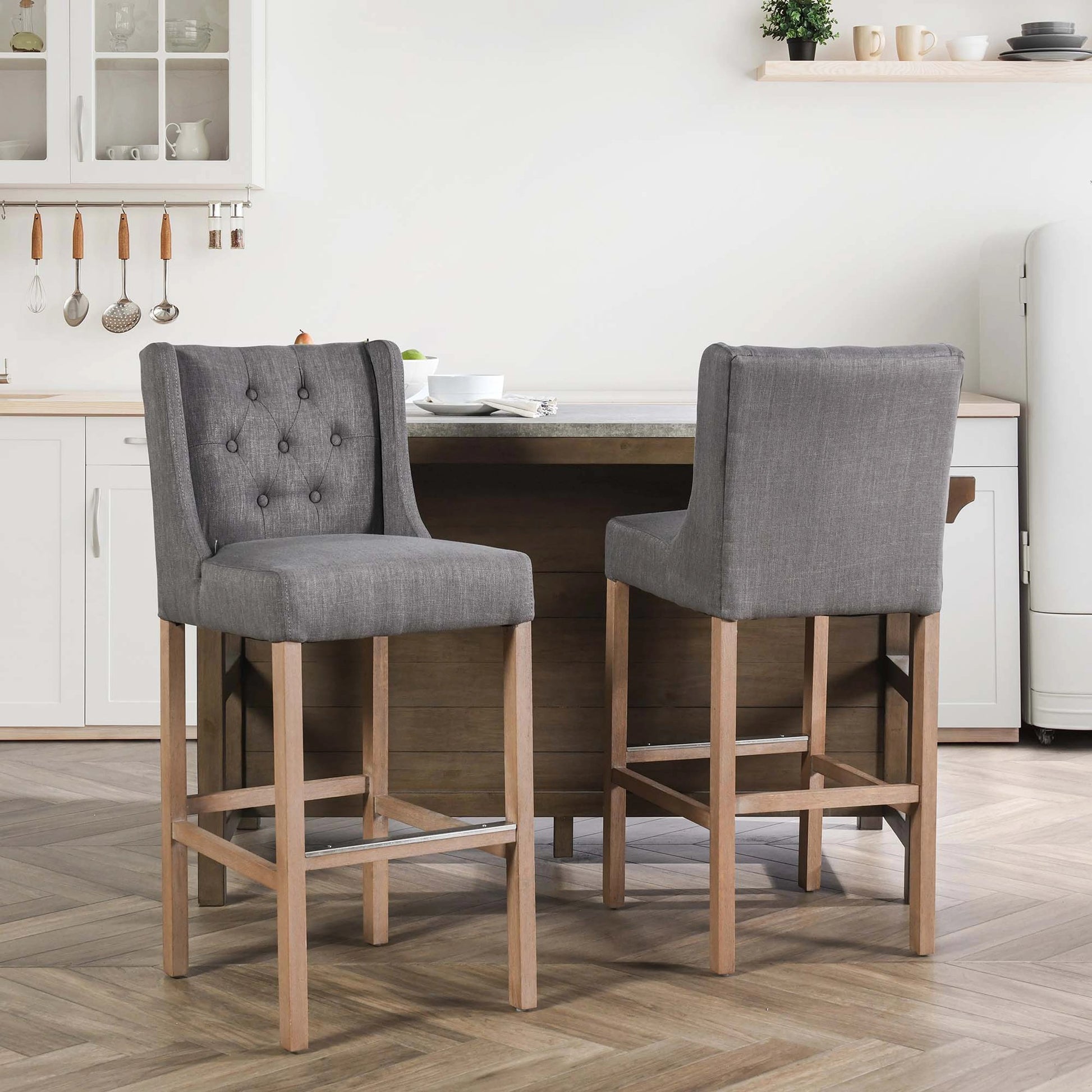 Karla Tufted Barstool by Kosas Home in gray. Made from blended upholstery (57% polyester 25% viscose 18% linen), rubber wood legs in a transitional style.