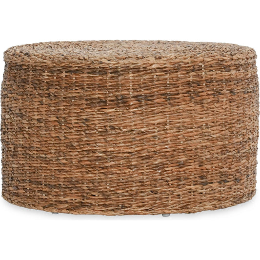 Ira Round Rattan Coffee Table by Kosas Home. Made from rattan abaca in a coastal style.
