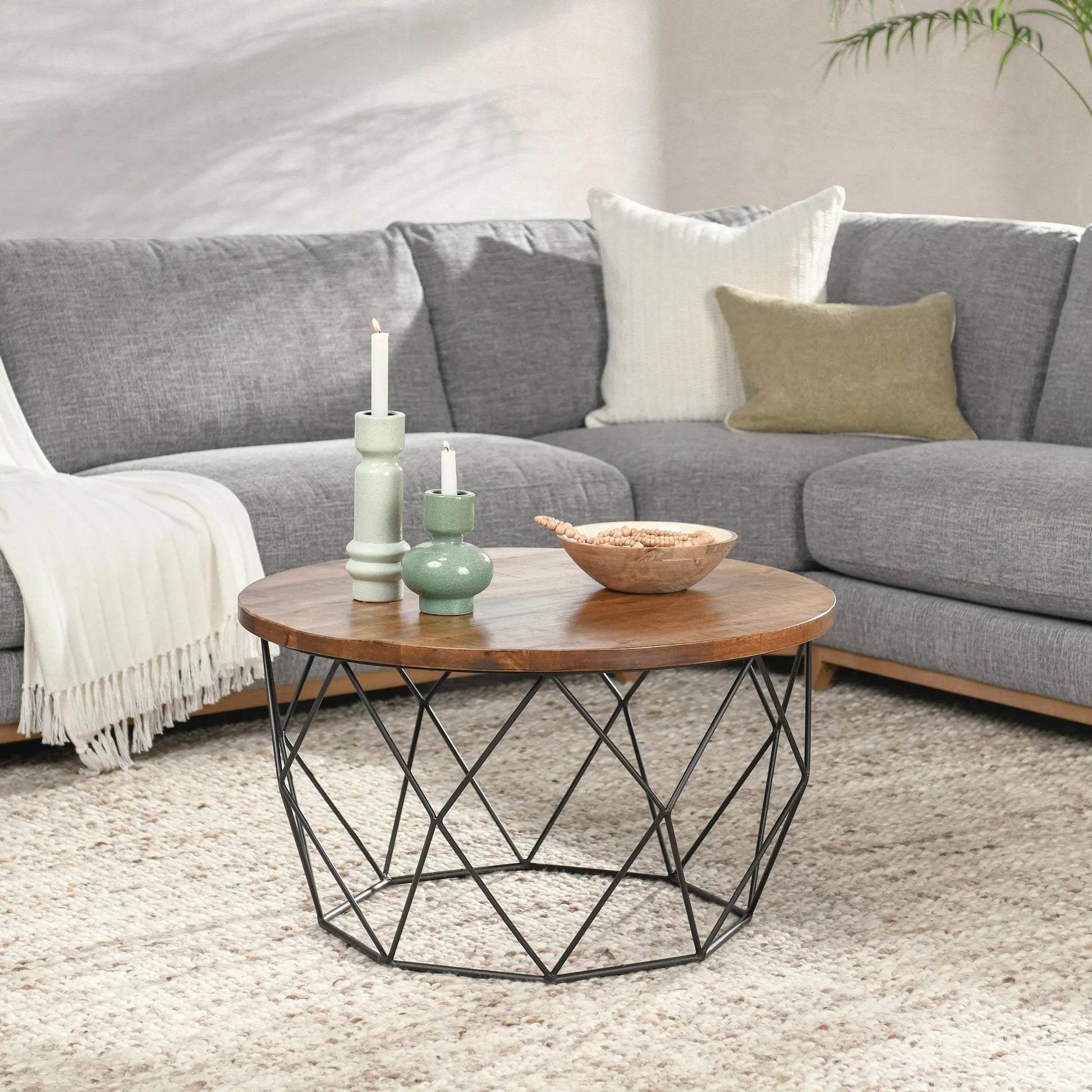 Chester Coffee Table by Kosas Home in chestnut brown top, black finish base. Made from mango wood top, iron base in a modern style.