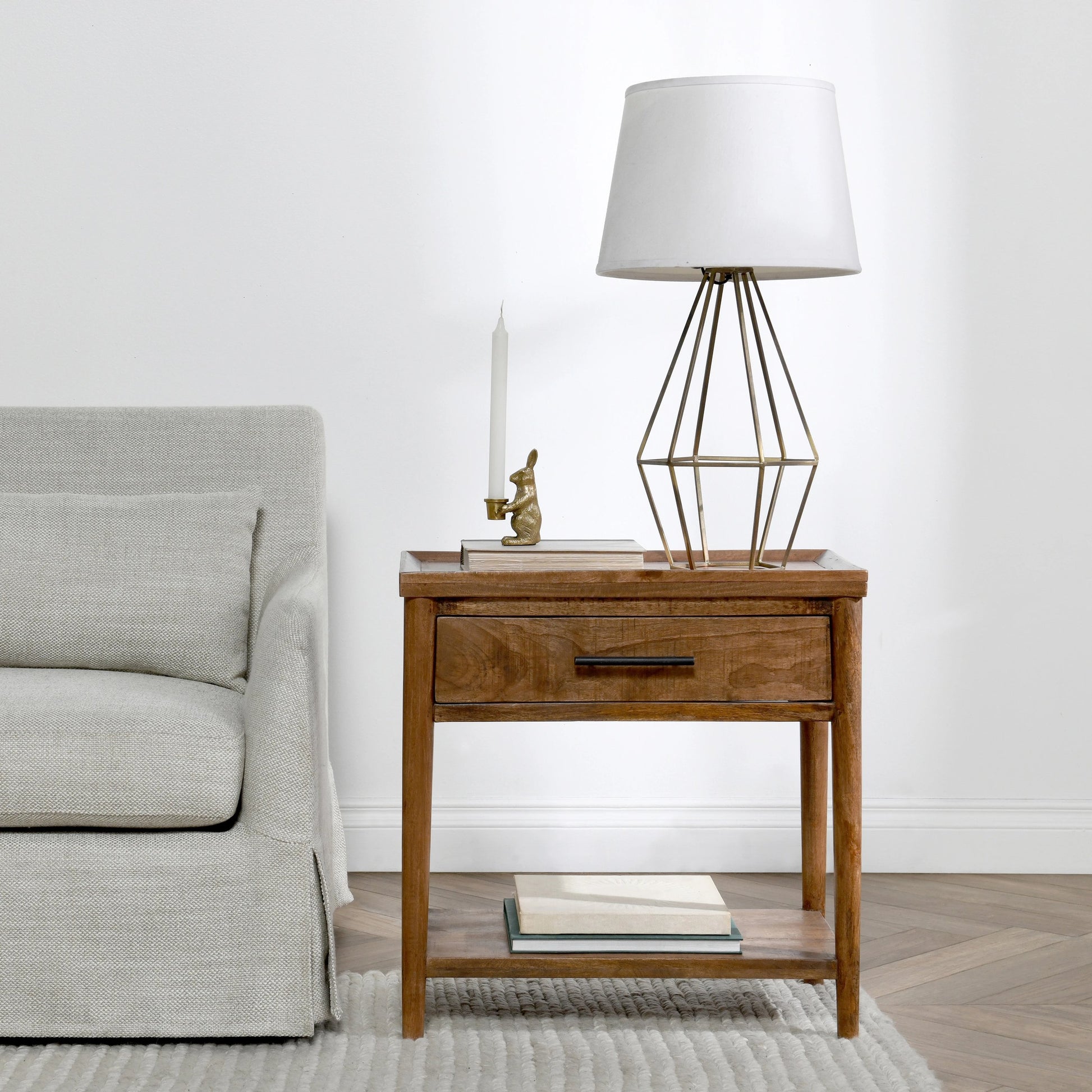 Ciaria 1 Drawer End Table by Kosas Home in medium brown. Made from mango wood in a modern style.