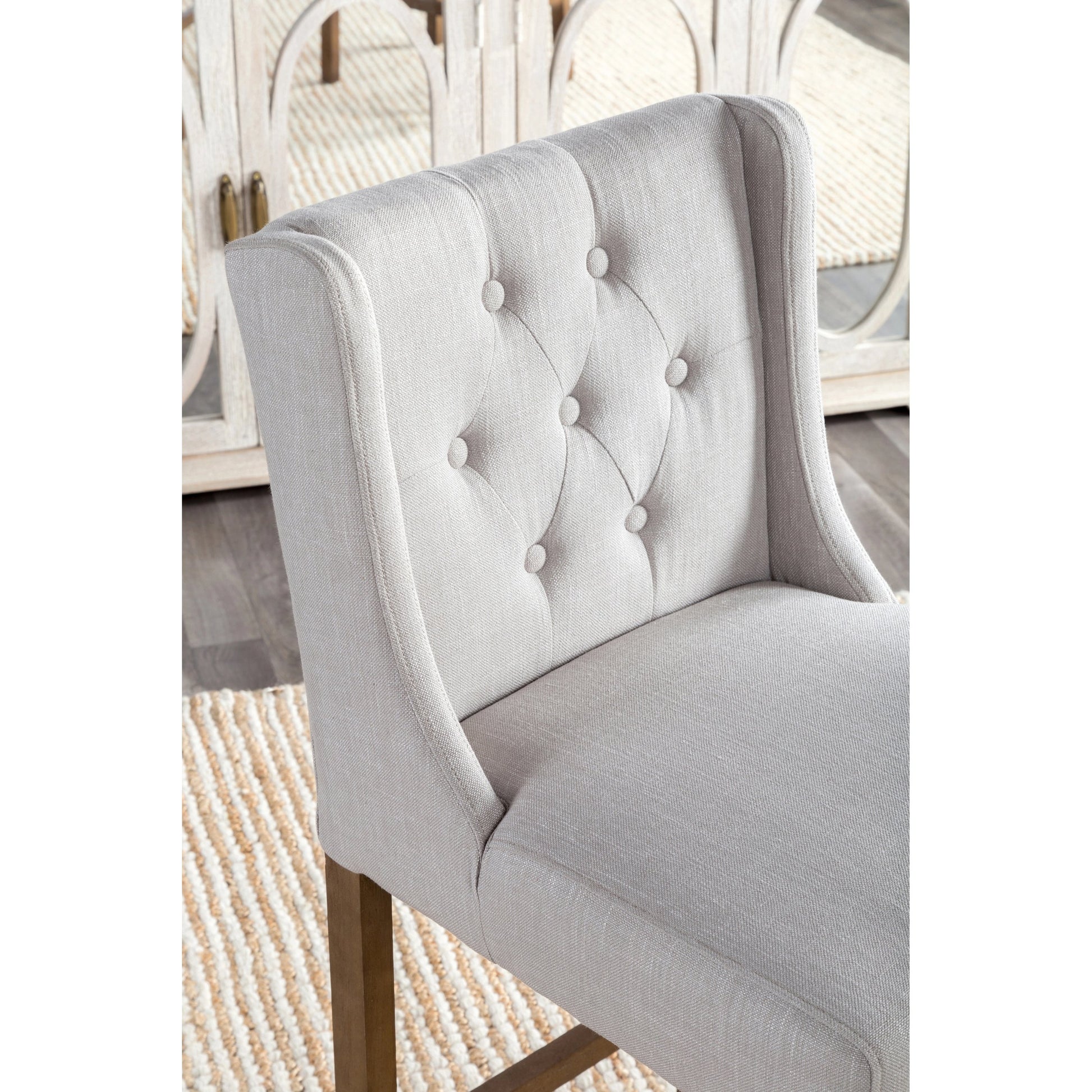 Karla Tufted Barstool by Kosas Home in gray. Made from blended upholstery (57% polyester 25% viscose 18% linen), rubber wood legs in a transitional style.