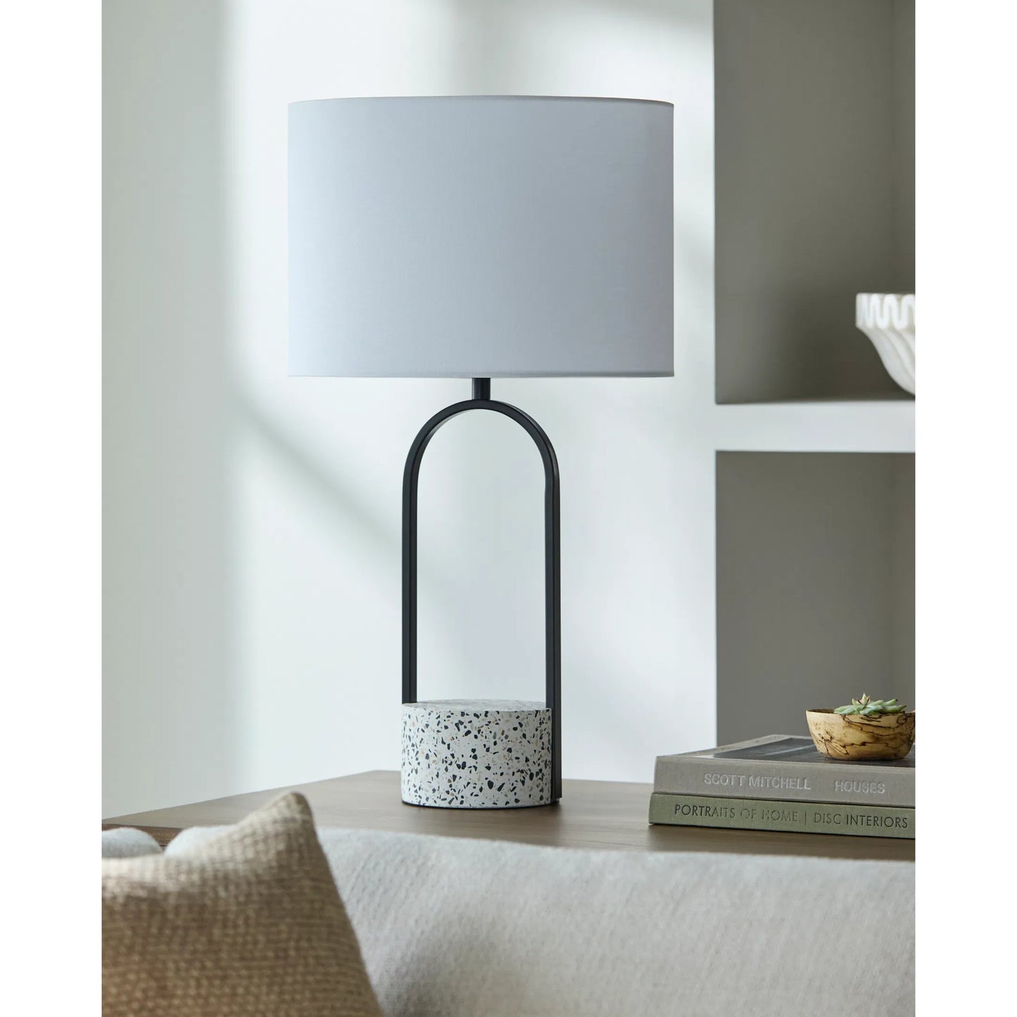 002 SI-2246082 | Lifestyle | Pella Accent Table Lamp by Livabliss in body: white, black; shade: white; finial: metallic - nickel; harp: metallic - nickel; cord: translucent and terrazzopaintedplated. Made from cement, iron, linen, polyester in a modern sty