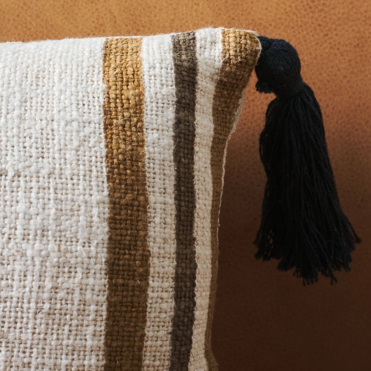 002 SI-2372765 | Closeup | Bienville Bolster Pillow by HedgeApple Essentials in brown, camel. Made from cotton, polyester, polyfiller in a modern style.