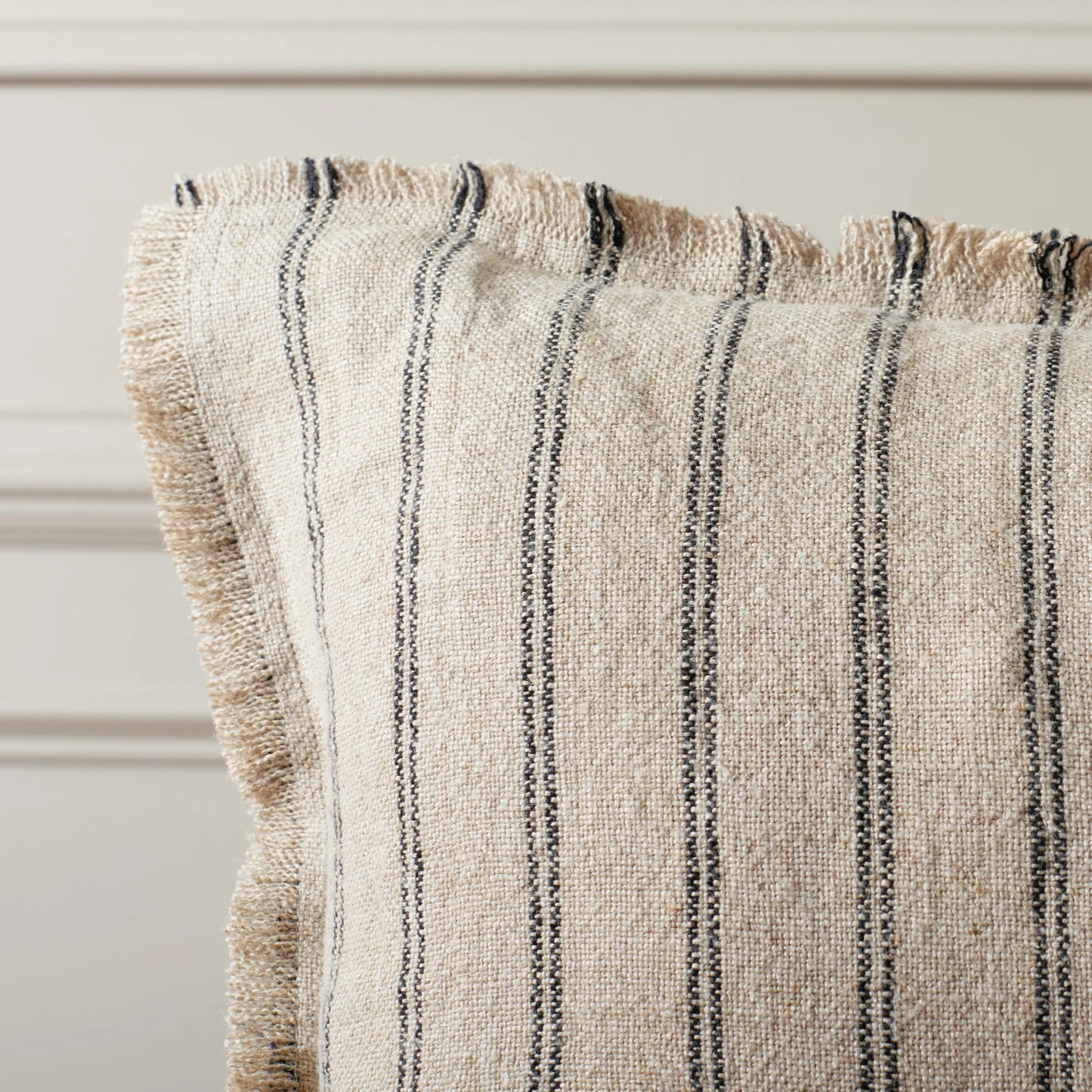 002 SI-2186007 | Closeup | Clare Pillow by HedgeApple Essentials in natural, black. Made from linen, zipper, 100% virgin quality vacuum packed filler in a modern style.