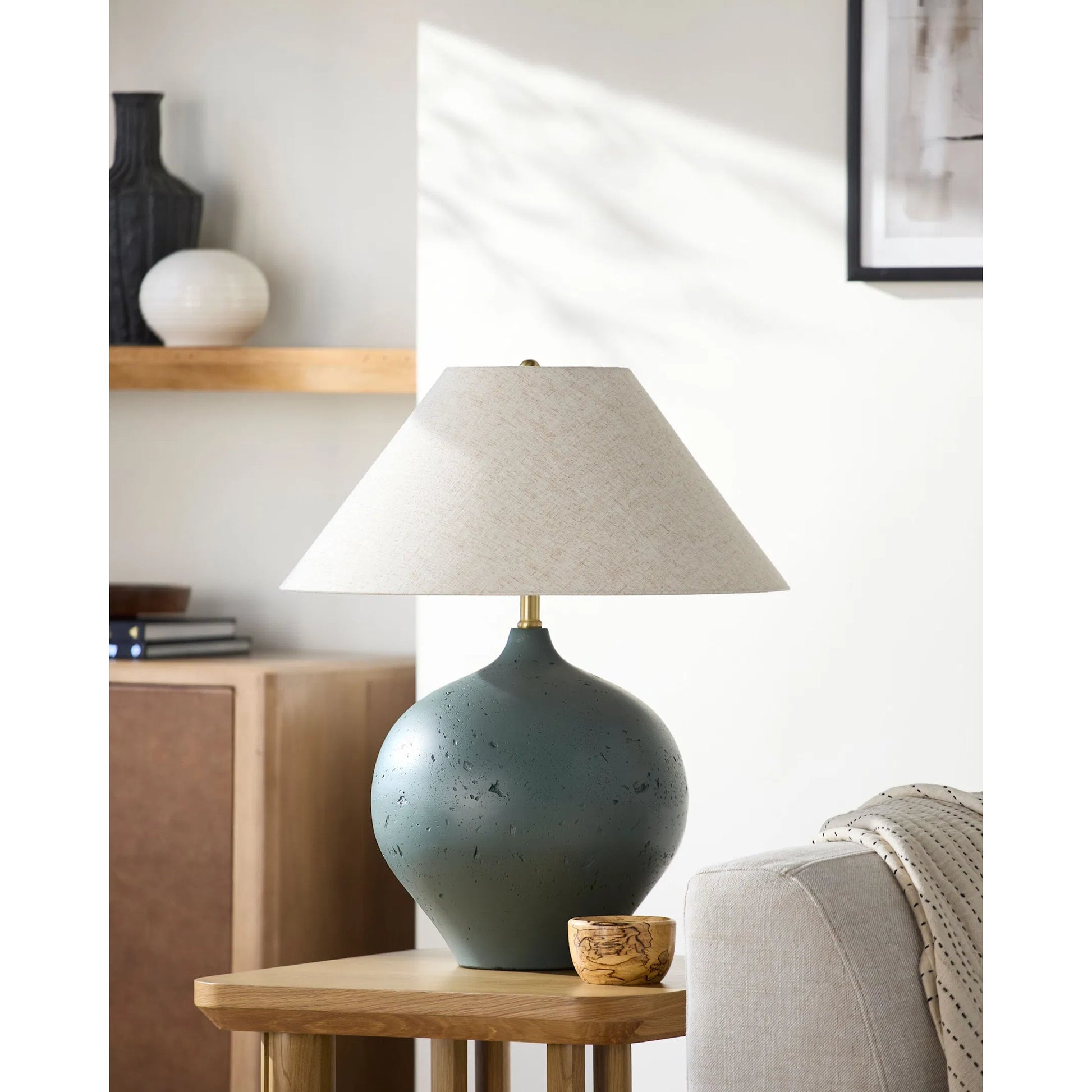 Pomarico Accent Table Lamp by Surya. Made from cement, linen, plastic in a transitional style.