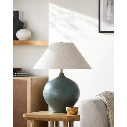 Pomarico Accent Table Lamp by Surya. Made from cement, linen, plastic in a transitional style.