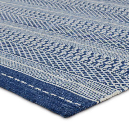 Penrose PNR06 Indoor/Outdoor Rug by Jaipur Living in navy, cream. Made from 100% polyester in a unique style.