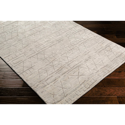 Pokhara POK-2300 Rug by Surya in taupe, ivory, light gray, gray. Made from 75% viscose, 25% wool in a unique style.