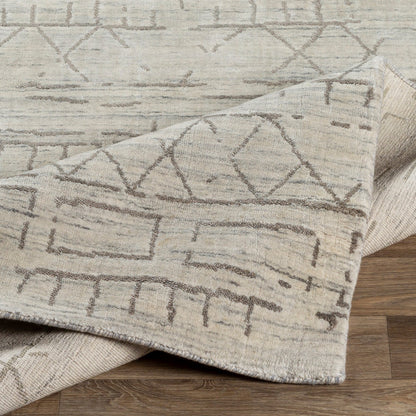 Pokhara POK-2300 Rug by Surya in taupe, ivory, light gray, gray. Made from 75% viscose, 25% wool in a unique style.