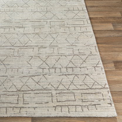 Pokhara POK-2300 Rug by Surya in taupe, ivory, light gray, gray. Made from 75% viscose, 25% wool in a unique style.