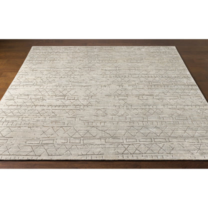Pokhara POK-2300 Rug by Surya in taupe, ivory, light gray, gray. Made from 75% viscose, 25% wool in a unique style.