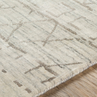Pokhara POK-2300 Rug by Surya in taupe, ivory, light gray, gray. Made from 75% viscose, 25% wool in a unique style.