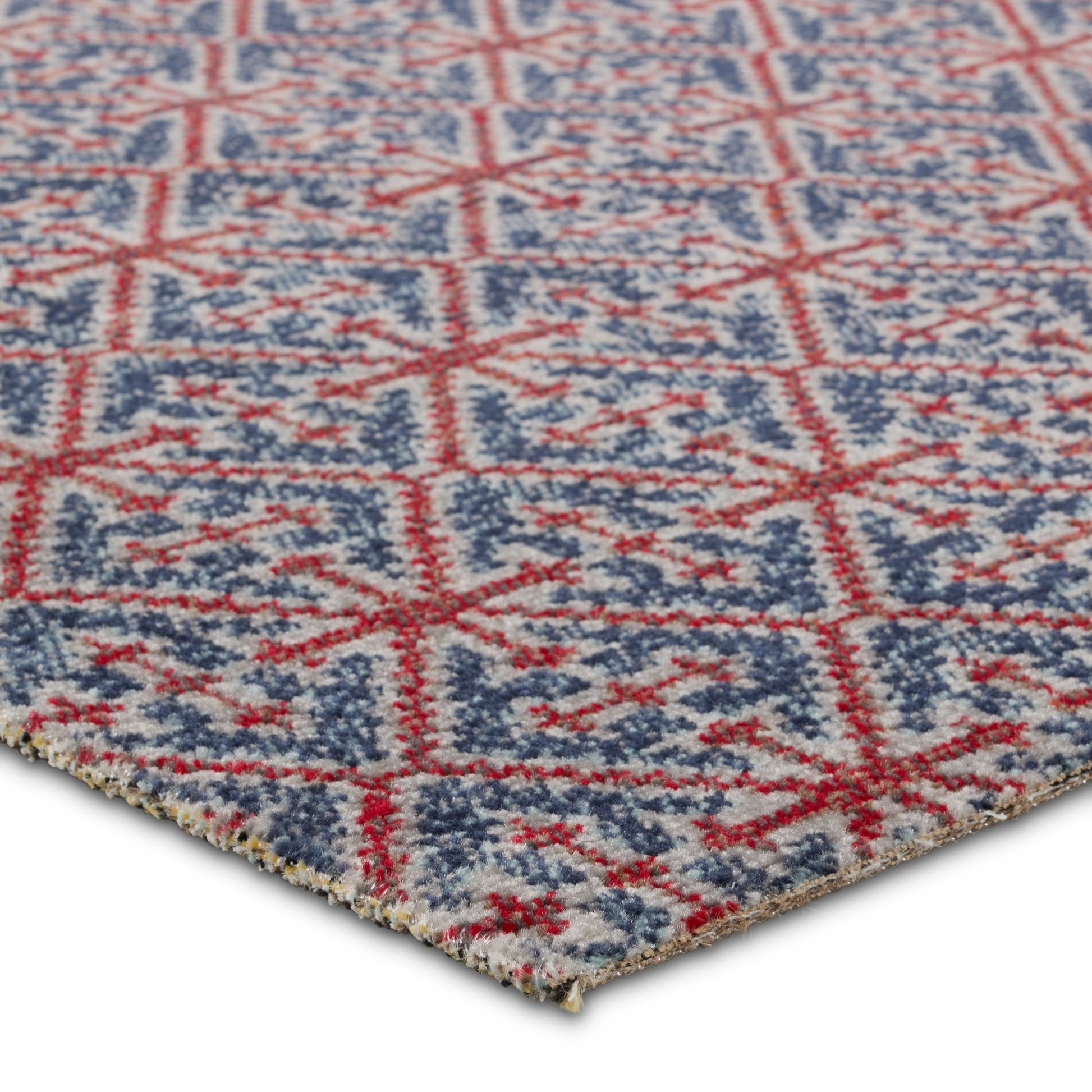 Polaris POL52 Indoor/Outdoor Rug by Jaipur Living in red, navy. Made from 100% polypropylene in a unique style.