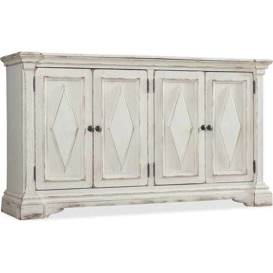 Four Door Cabinet by Hooker Furniture in distressed white. Made from hardwoods in a modern style.