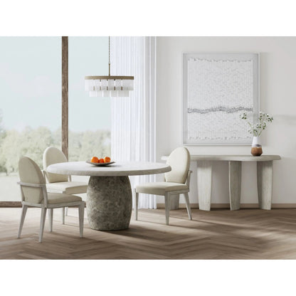 Ashlar Round Dining Table by A.R.T. Furniture in bisque, sanded bronze. Made from parawood solids, birch veneers, resin in a transitional style.