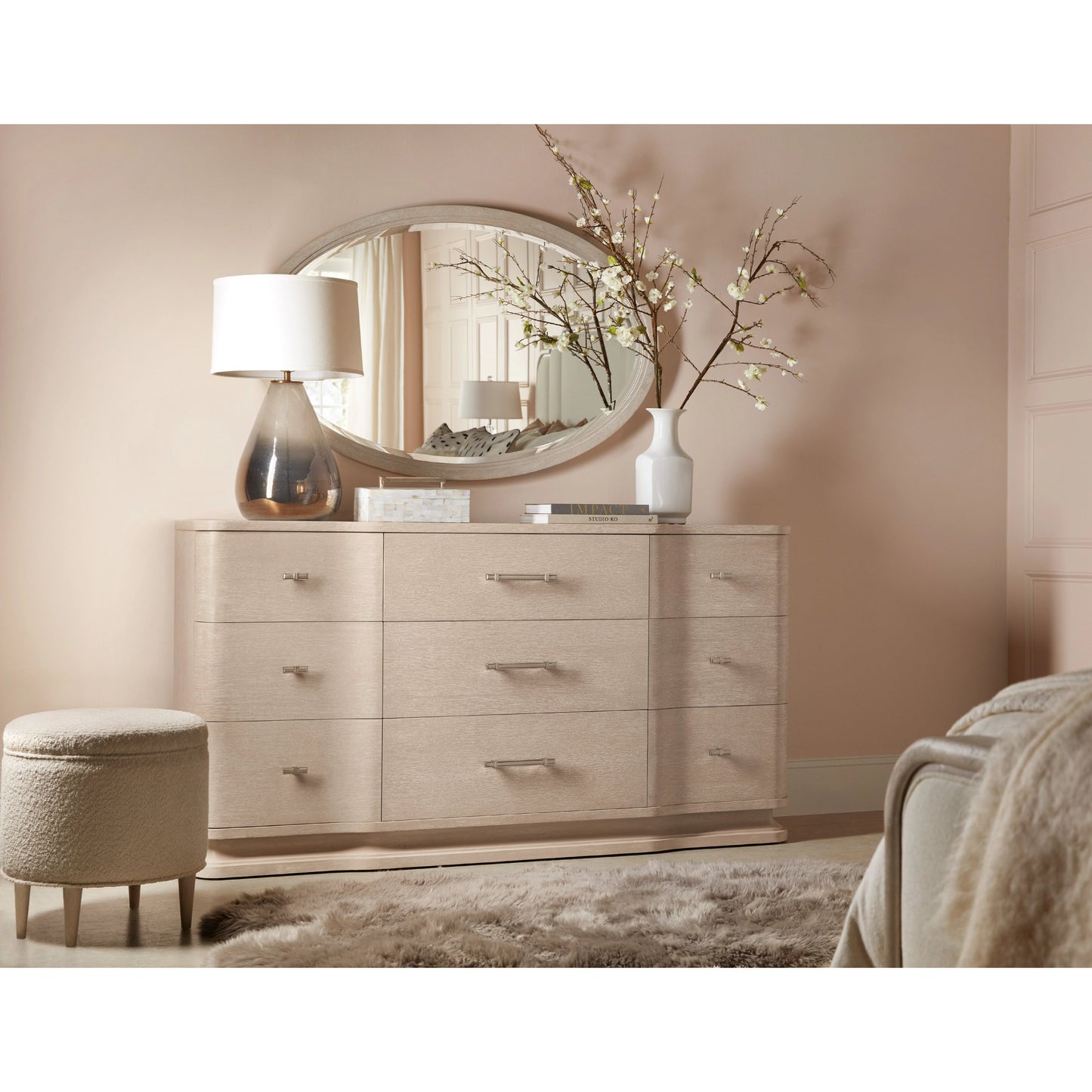 003 SI-2028946 | Lifestyle | Nouveau Chic Oval Mirror by Hooker Furniture in sandstone. Made from wood, mirror glass in a modern style.