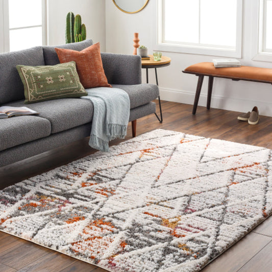 Polaris Rug by Livabliss in white, gray, black, burnt orange, burgandy, amber. Made from 100% polyester in a modern style.