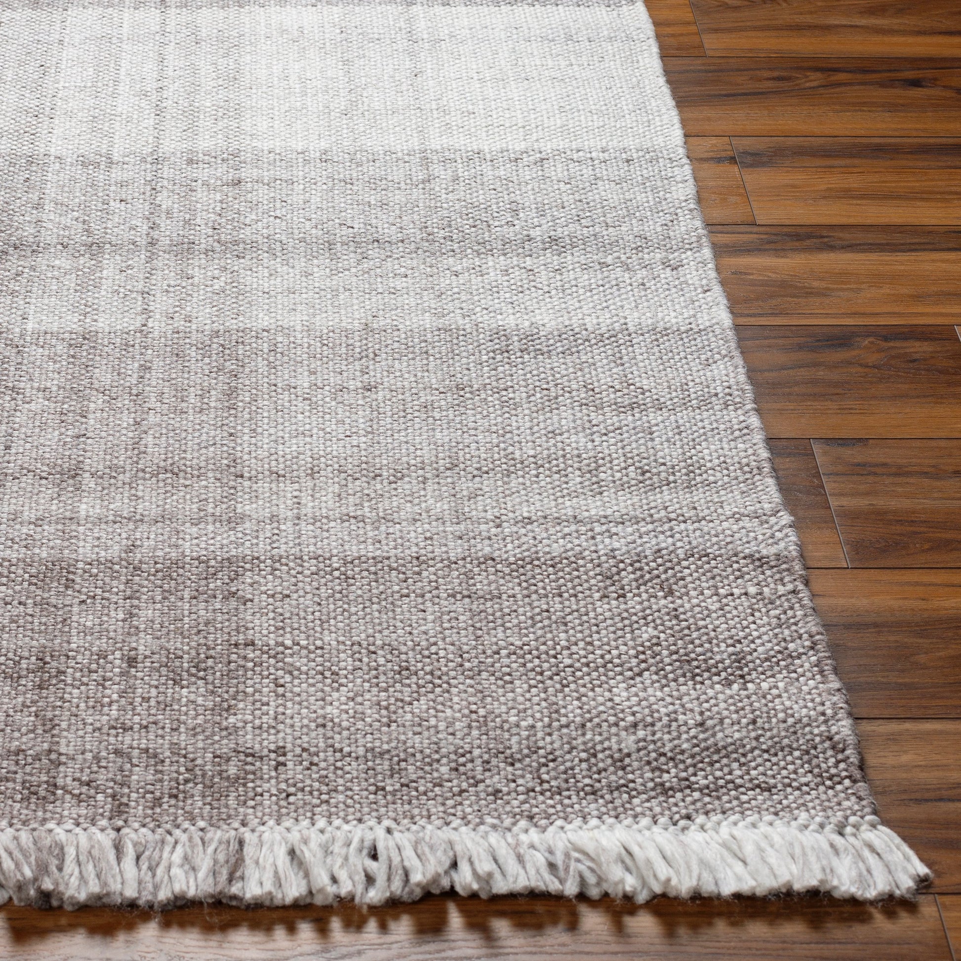 Primrose PRM-2307 Indoor/Outdoor Rug by Livabliss in dark brown, taupe, off-white. Made from 100% recycled pet yarn in a unique style.