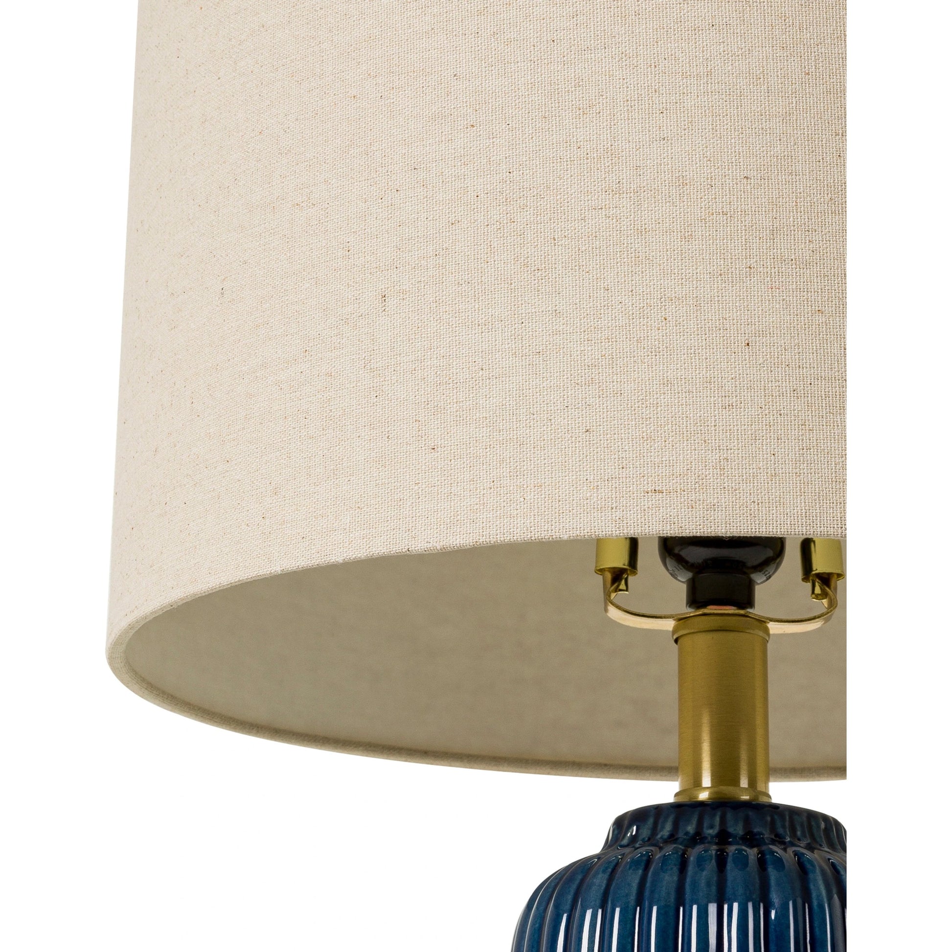 Patras - 31040 by Livabliss in body: blue, shade: white, finial: metallic - brass, harp: metallic - nickel, cord: translucent and glazedbrushed. Made from shade (outside): linen, shade (inside): polyester, body: ceramic, finial: 