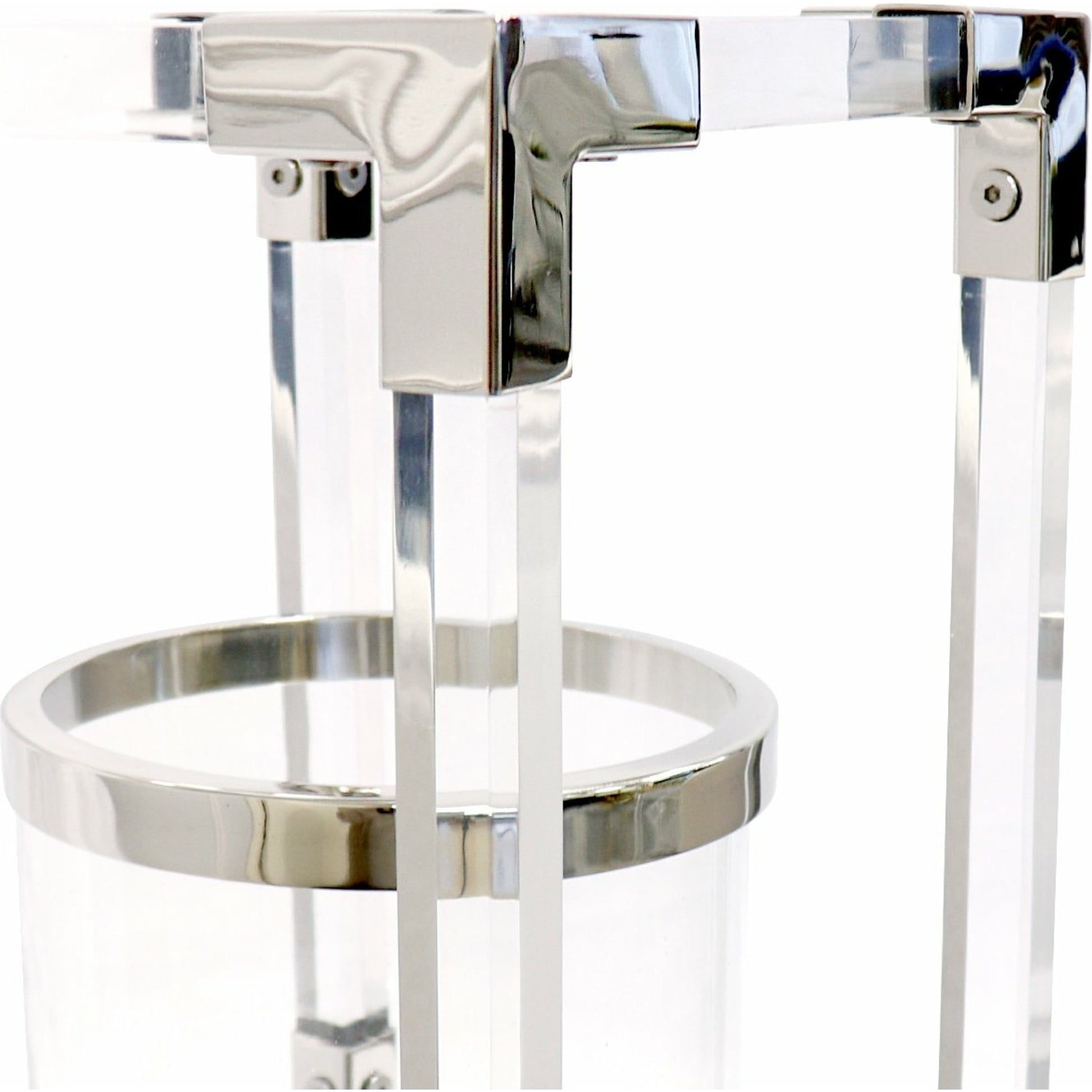 Soren Lantern by Pasargad Home in clear. Made from lucite, steel in a transitional style.