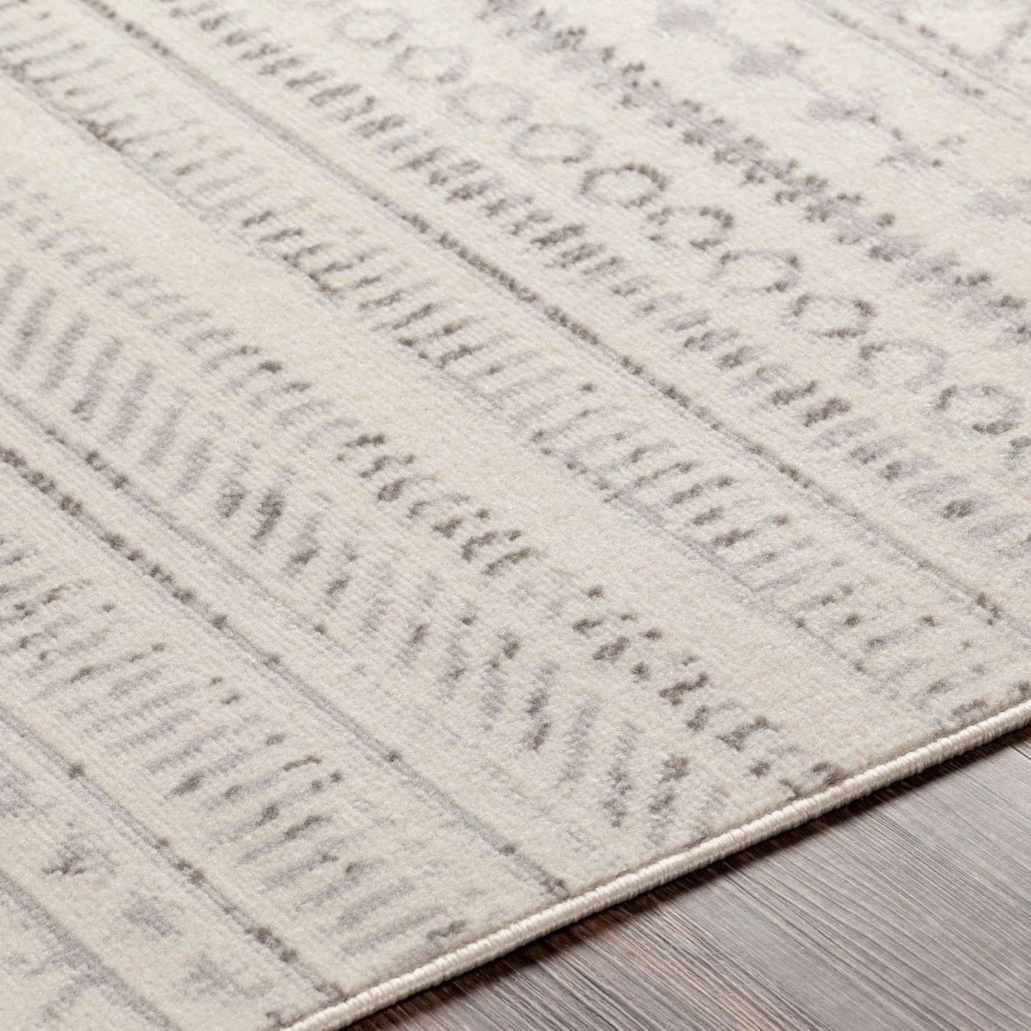 005 SI-2046699 | Closeup | Pisa Rug - 24538 by Livabliss in medium gray, charcoal, off-white, light slate. Made from face: 100% polypropylene, warp: 100% polypropylene in a unique style.