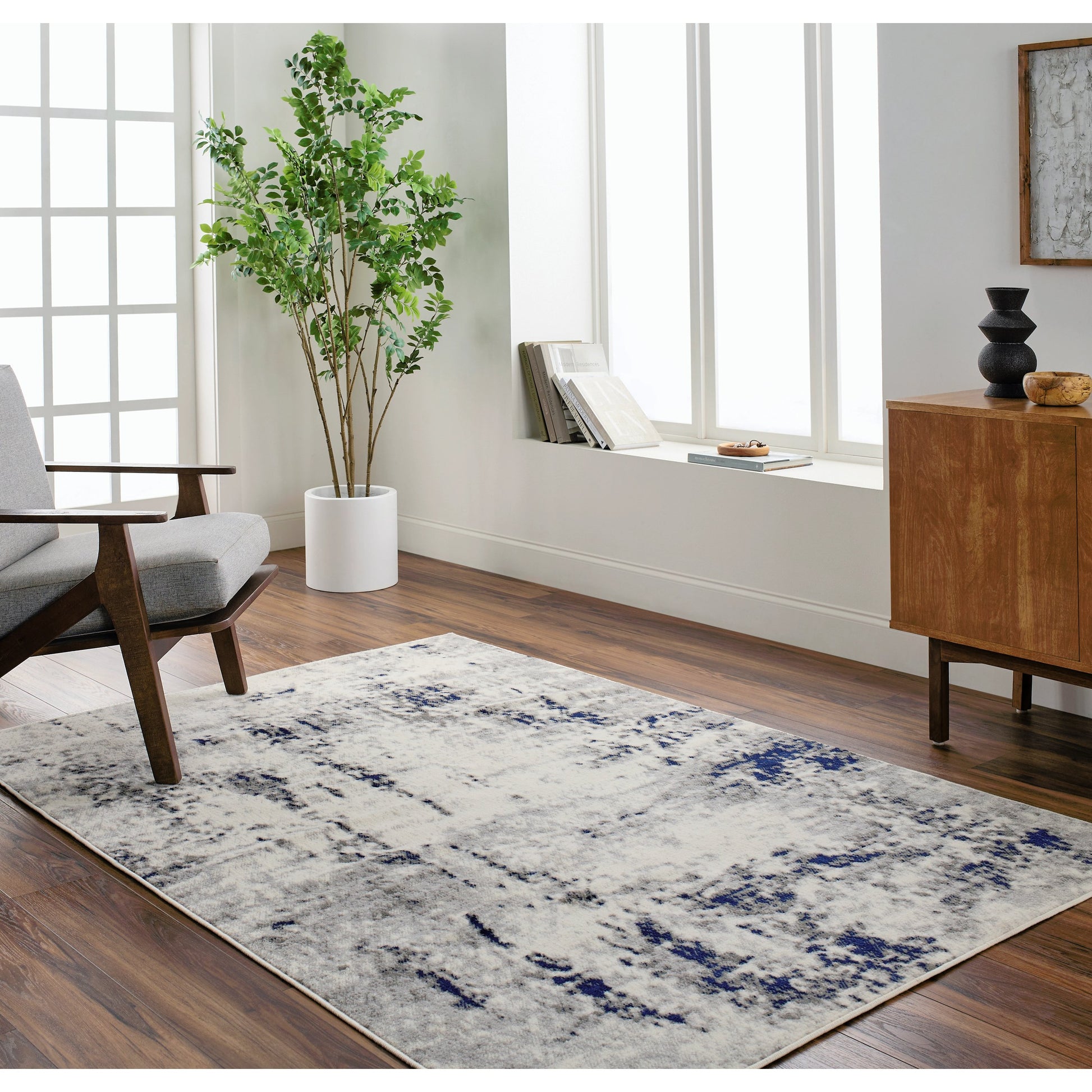 Pisa Rug - 14634 by Livabliss in light gray, medium gray, charcoal, dark blue. Made from face: 100% polypropylene, warp: 100% polypropylene in a unique style.