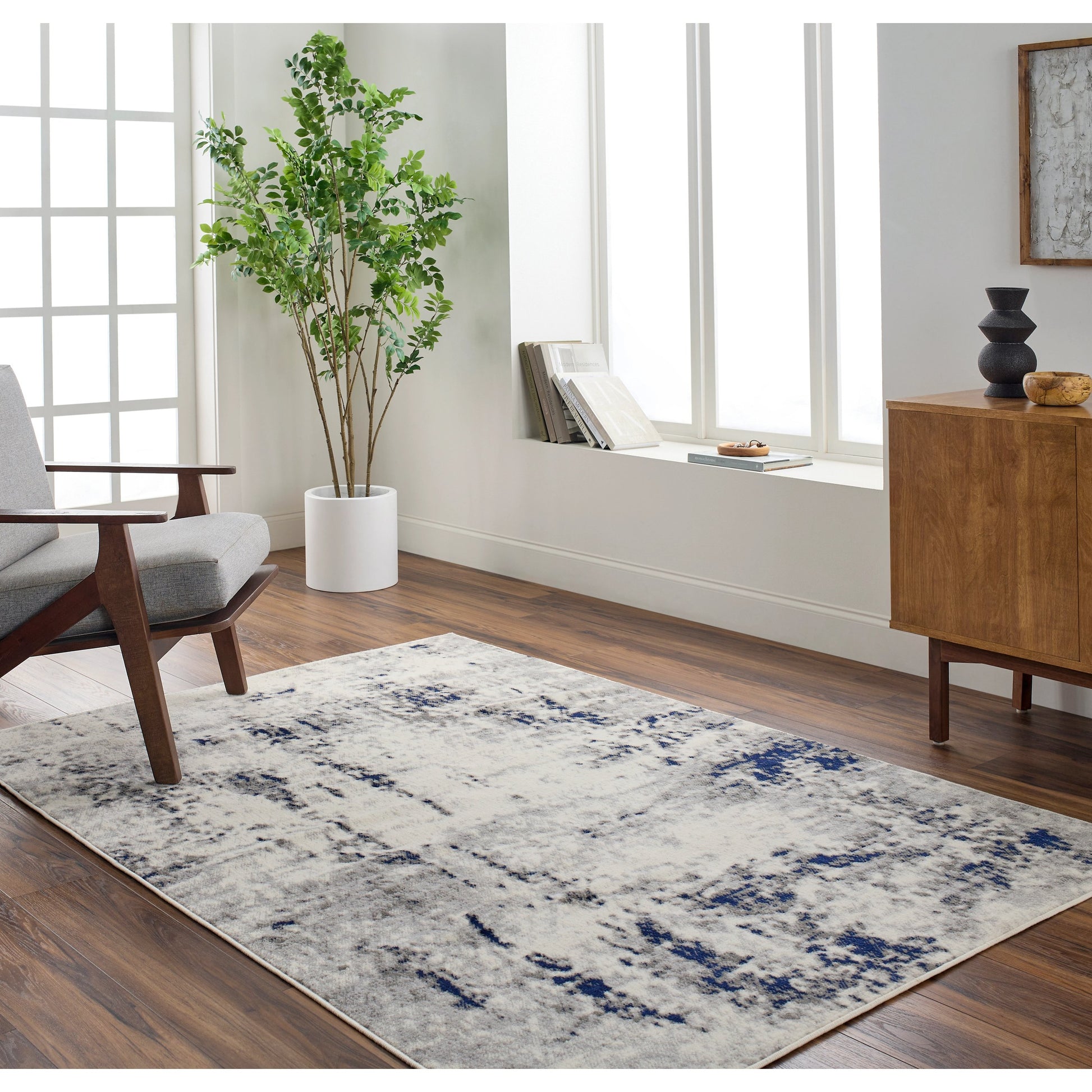 Pisa Rug - 14634 by Livabliss in light gray, medium gray, charcoal, dark blue. Made from face: 100% polypropylene, warp: 100% polypropylene in a unique style.