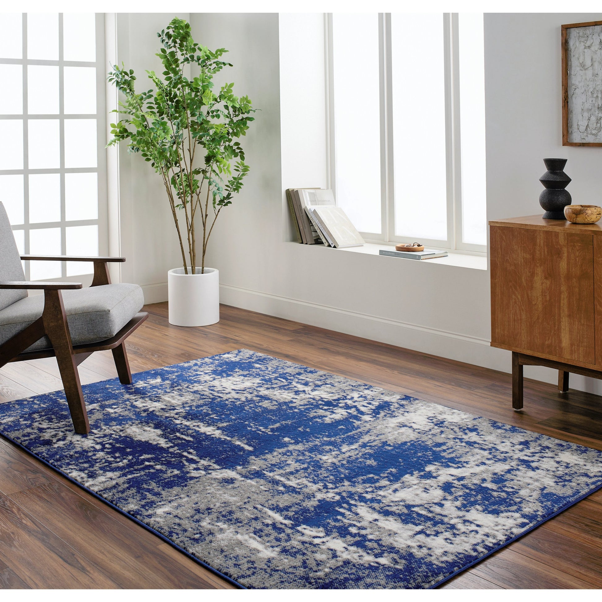 Pisa Rug - 14634 by Livabliss in light gray, medium gray, charcoal, dark blue. Made from face: 100% polypropylene, warp: 100% polypropylene in a unique style.