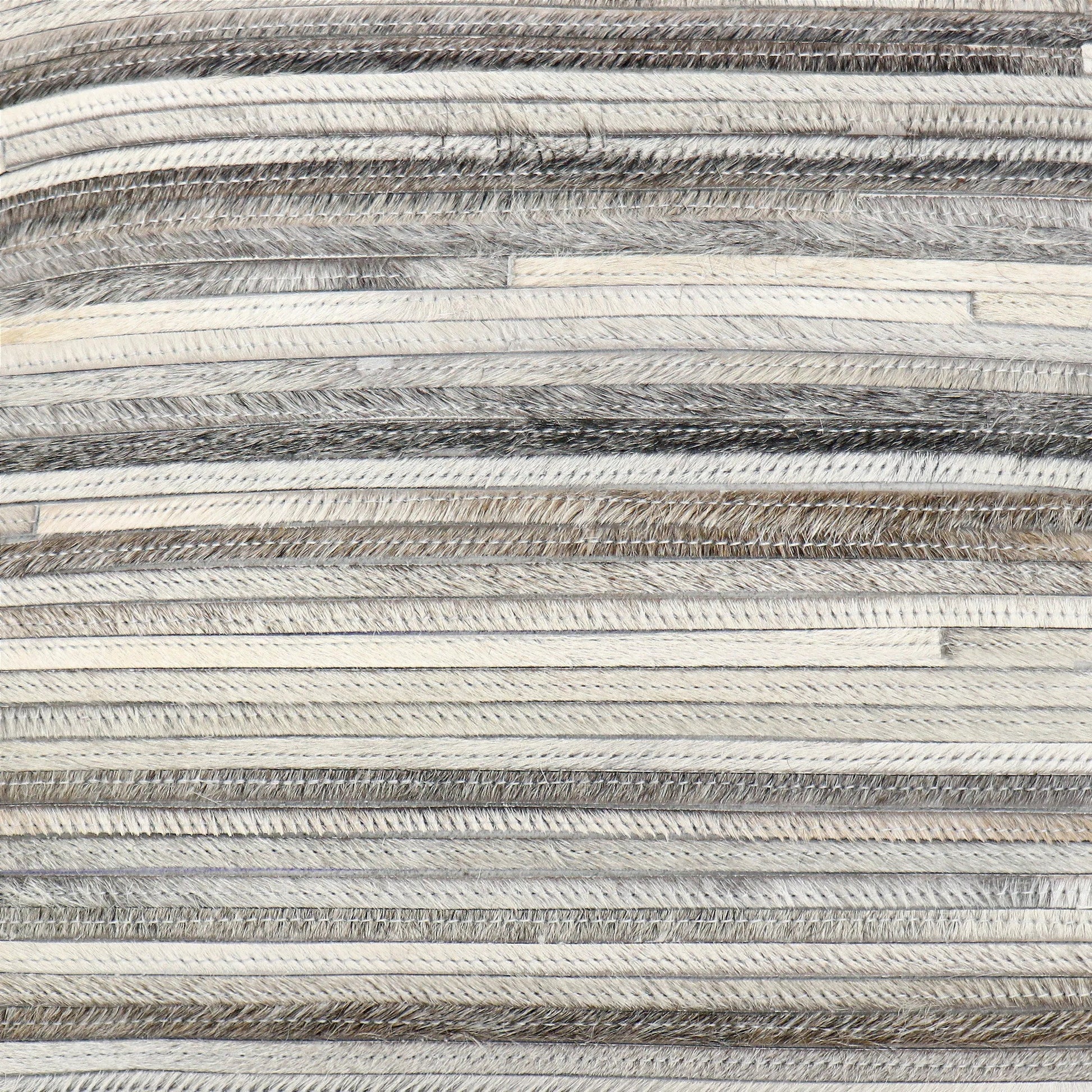 Galaxy Cowhide Pillow by Pasargad Home in ivory. Made from cowhide in a eclectic & global style.