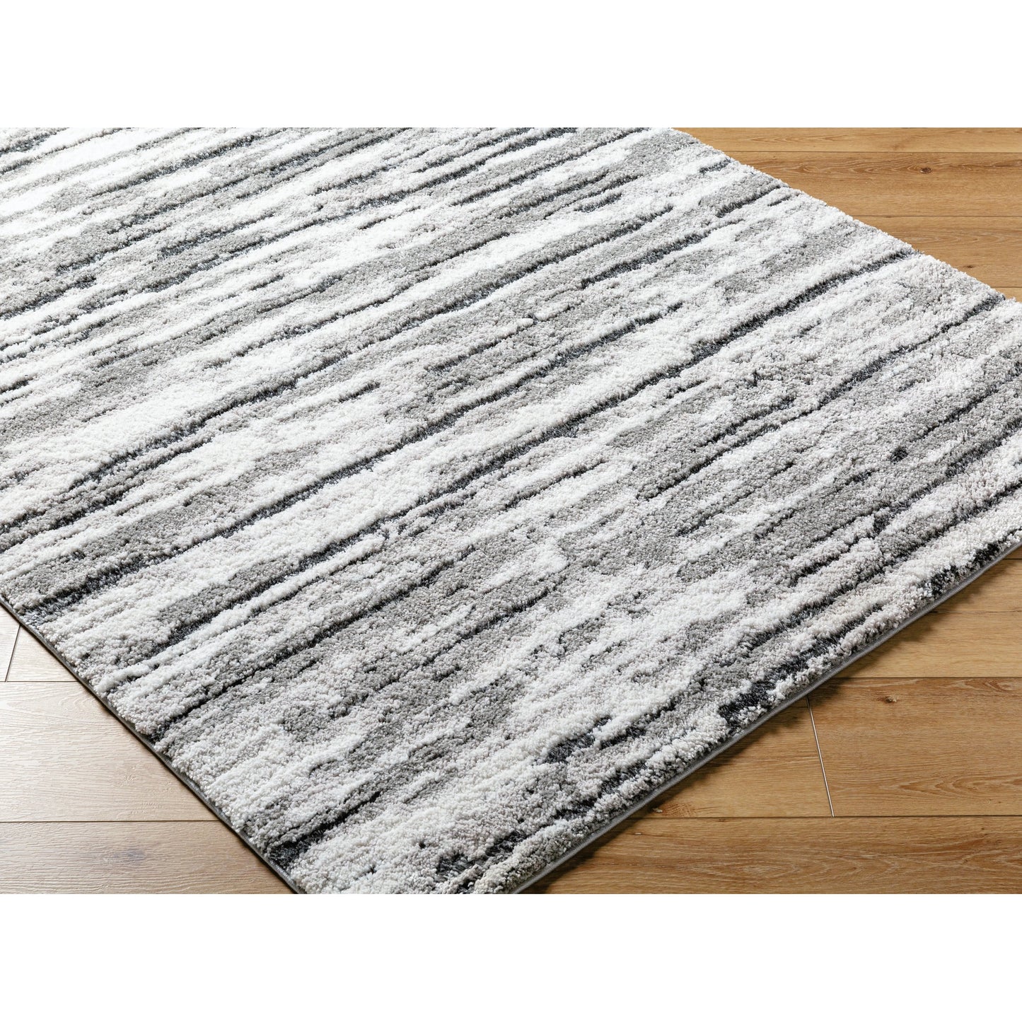 006 SI-2133149,SI-2133150,SI-2133151,SI-2133152 | Closeup | Portofino Rug - 530010 by Livabliss in white, light gray, medium gray, charcoal. Made from face: 77% polypropylene, 23% polyester, warp: 100% cotton in a unique style.