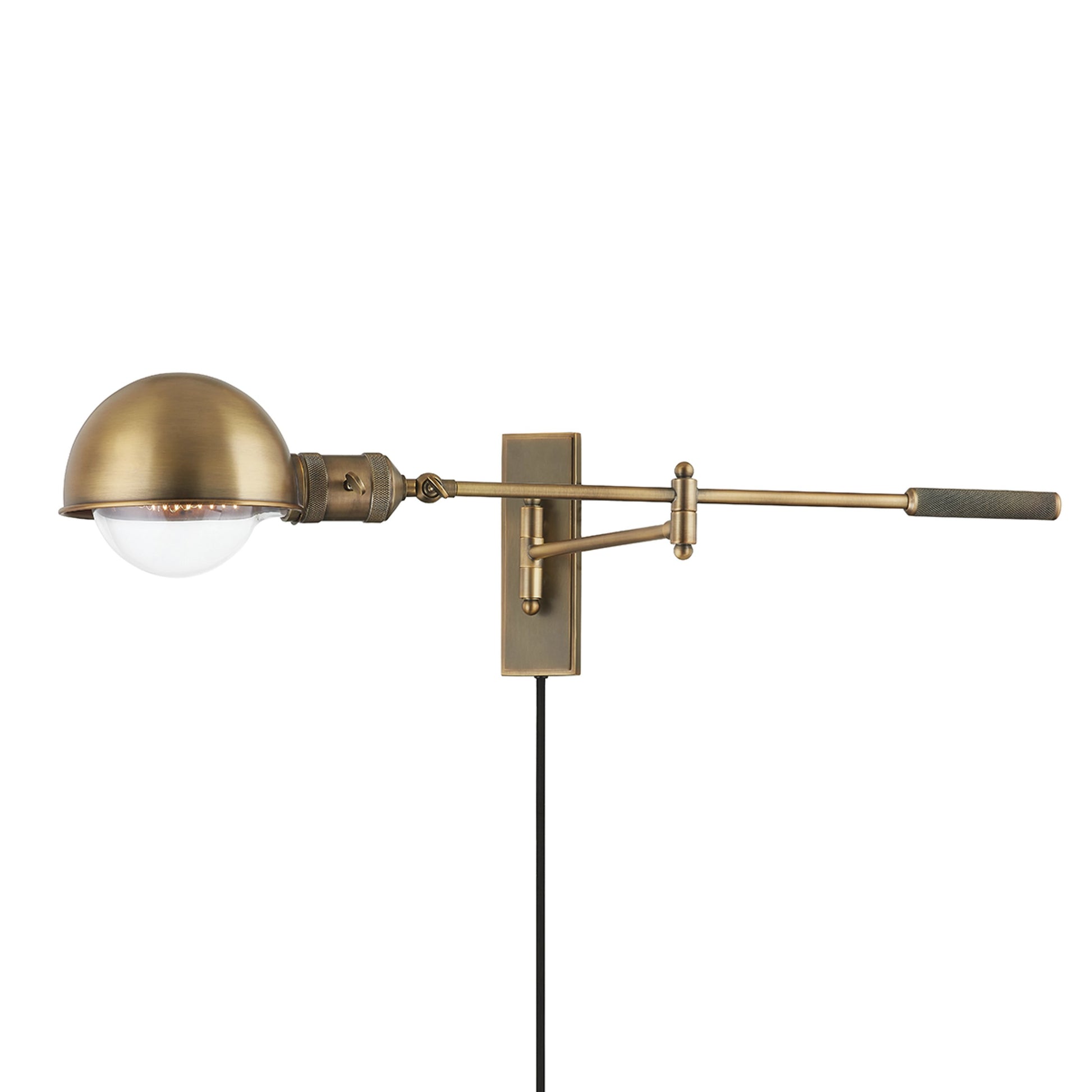Cannon Portable Wall Sconce by Troy in patina brass. Made from steel in a modern style.
