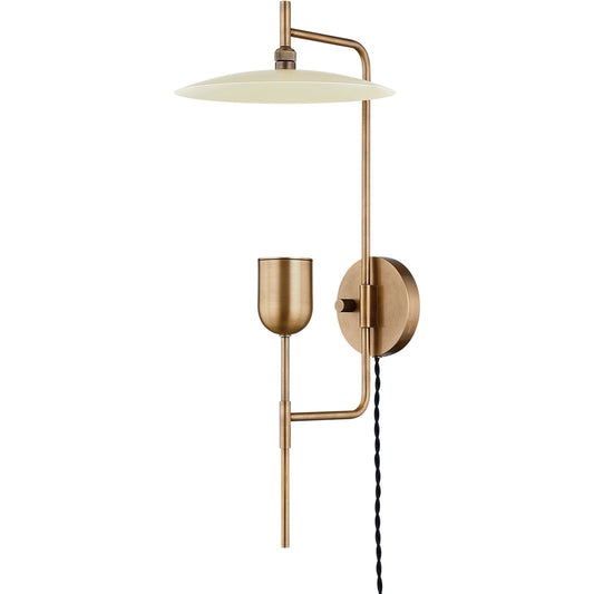 Manti 1 Light Plug-In Sconce by Troy in patina brass, soft sand. Made from brass in a modern style.