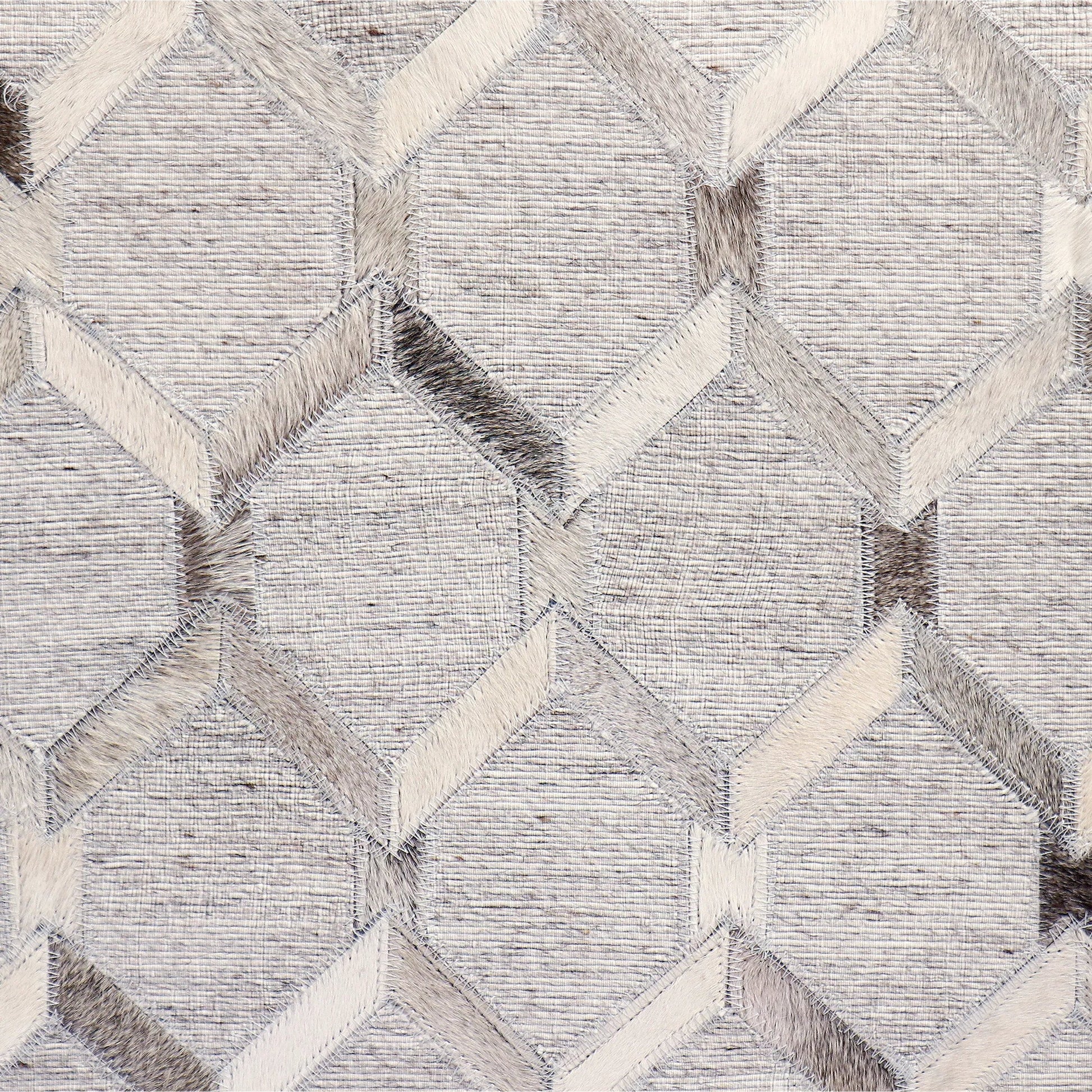 Galaxy Geometric Cowhide Ottoman by Pasargad Home in silver. Made from cowhide in a eclectic & global style.