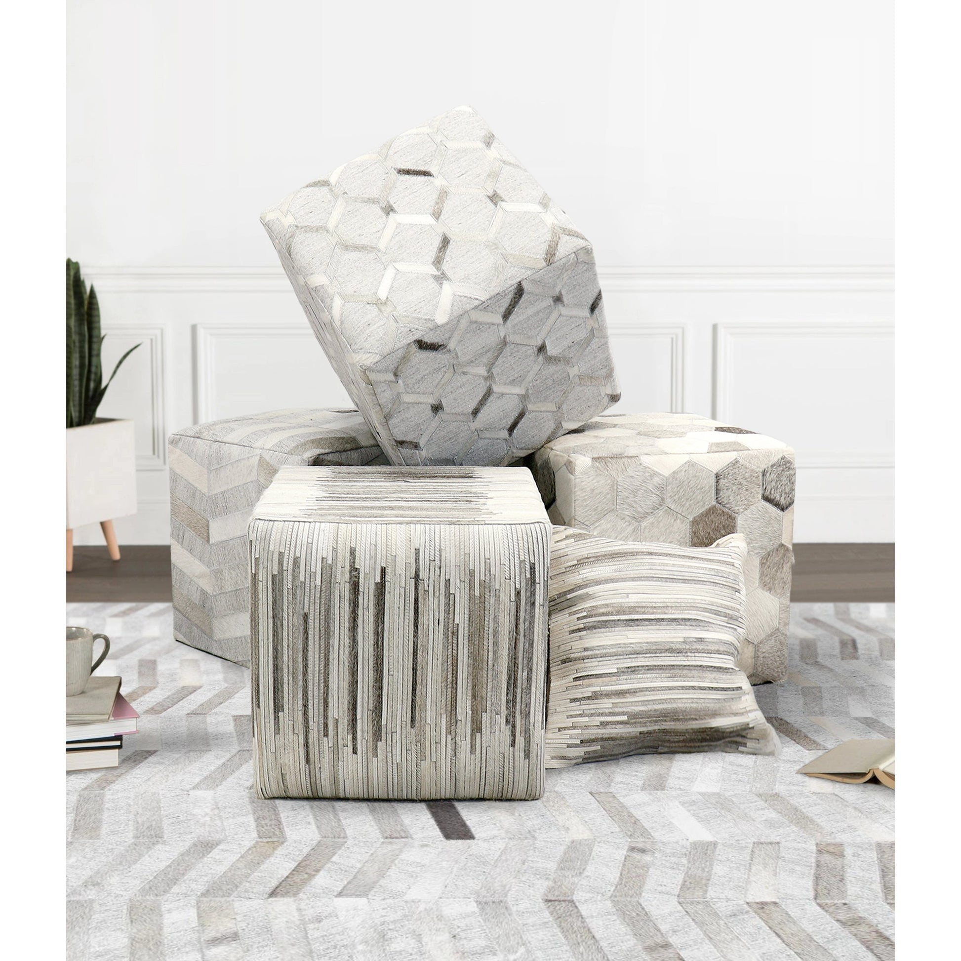 Galaxy Cowhide Ottoman by Pasargad Home in silver. Made from cowhide in a modern style.