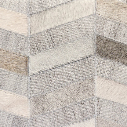 Galaxy Cowhide Zig-Zag Cube Ottoman by Pasargad Home in silver. Made from cowhide, sari silk in a eclectic & global style.