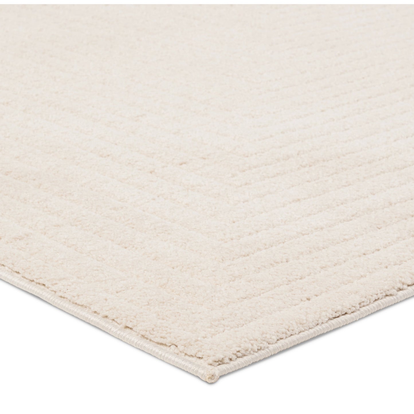 002 SI-2077654,SI-2077655,SI-2077656,SI-2077657,SI-2077658 | Closeup | Petros PTR06 Rug by Jaipur Living in cream. Made from 100% polyester in a unique style.