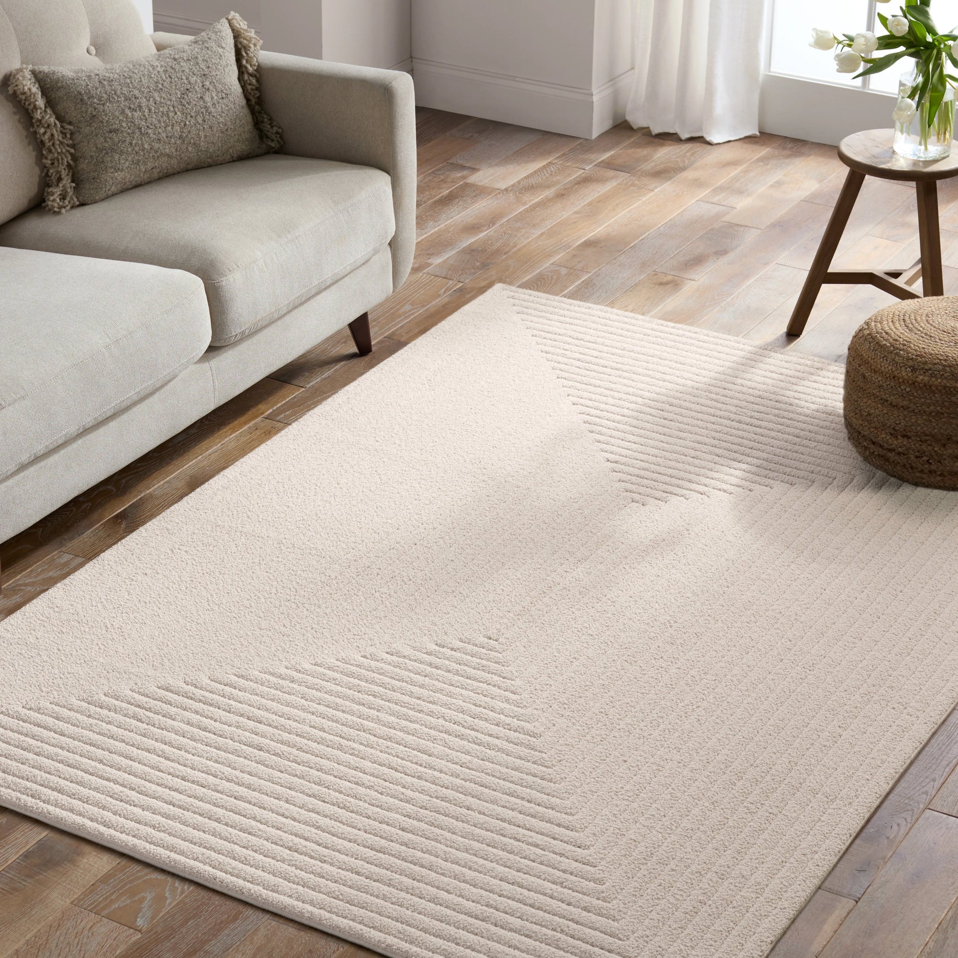 Petros PTR06 Rug by Jaipur Living in cream. Made from 100% polyester in a unique style.